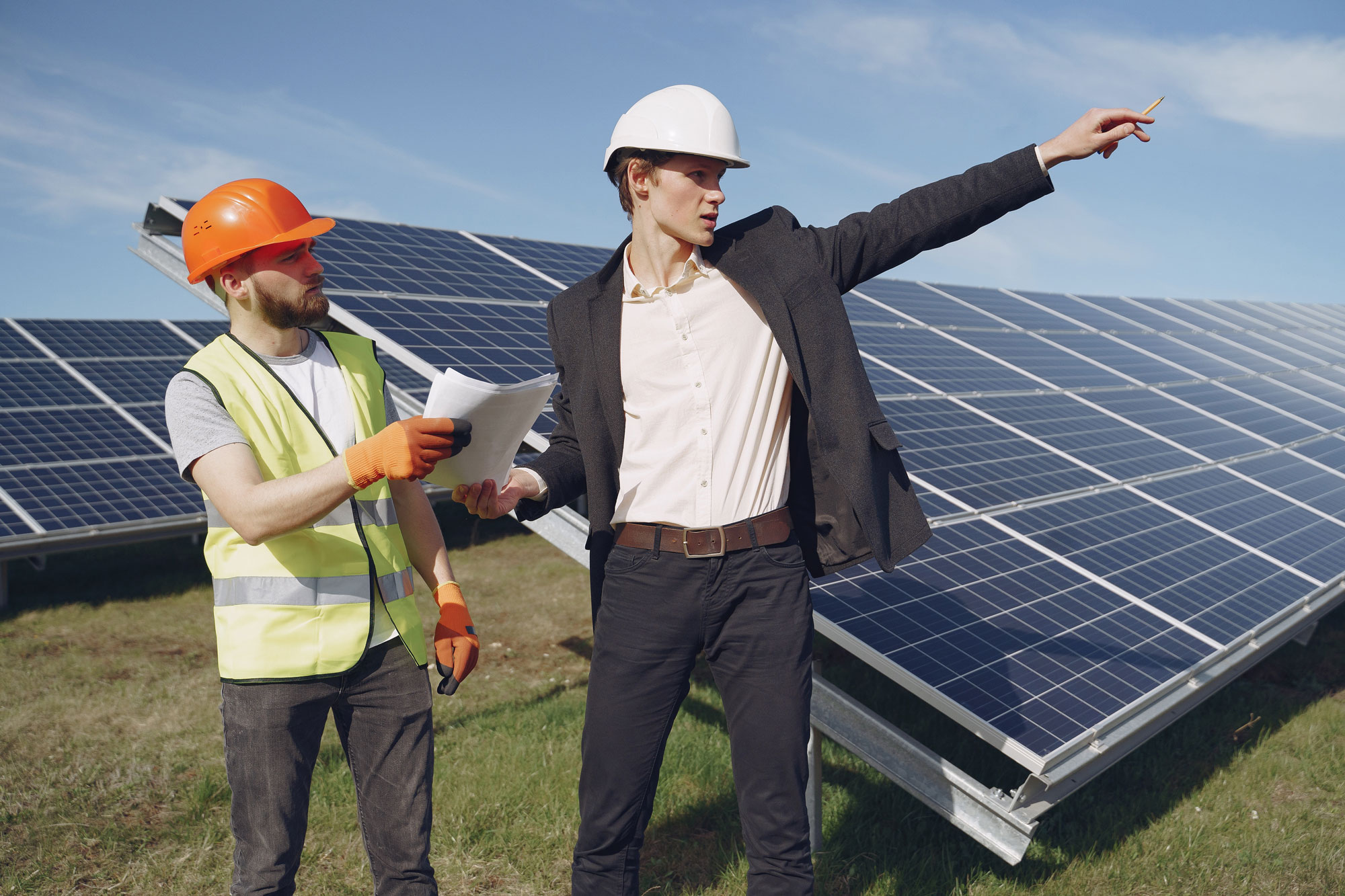 Real estate advertisement showcasing a home with solar panel installations