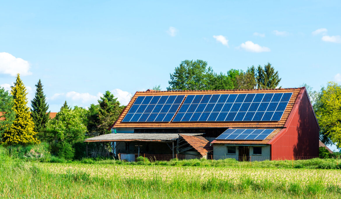 Modern home with solar panel installations harnessing solar energy.